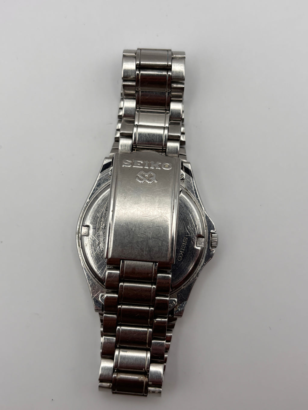 Seiko SQ100 5Y23-8A50 Vintage Quartz Watch Day-Date Stainless Steel