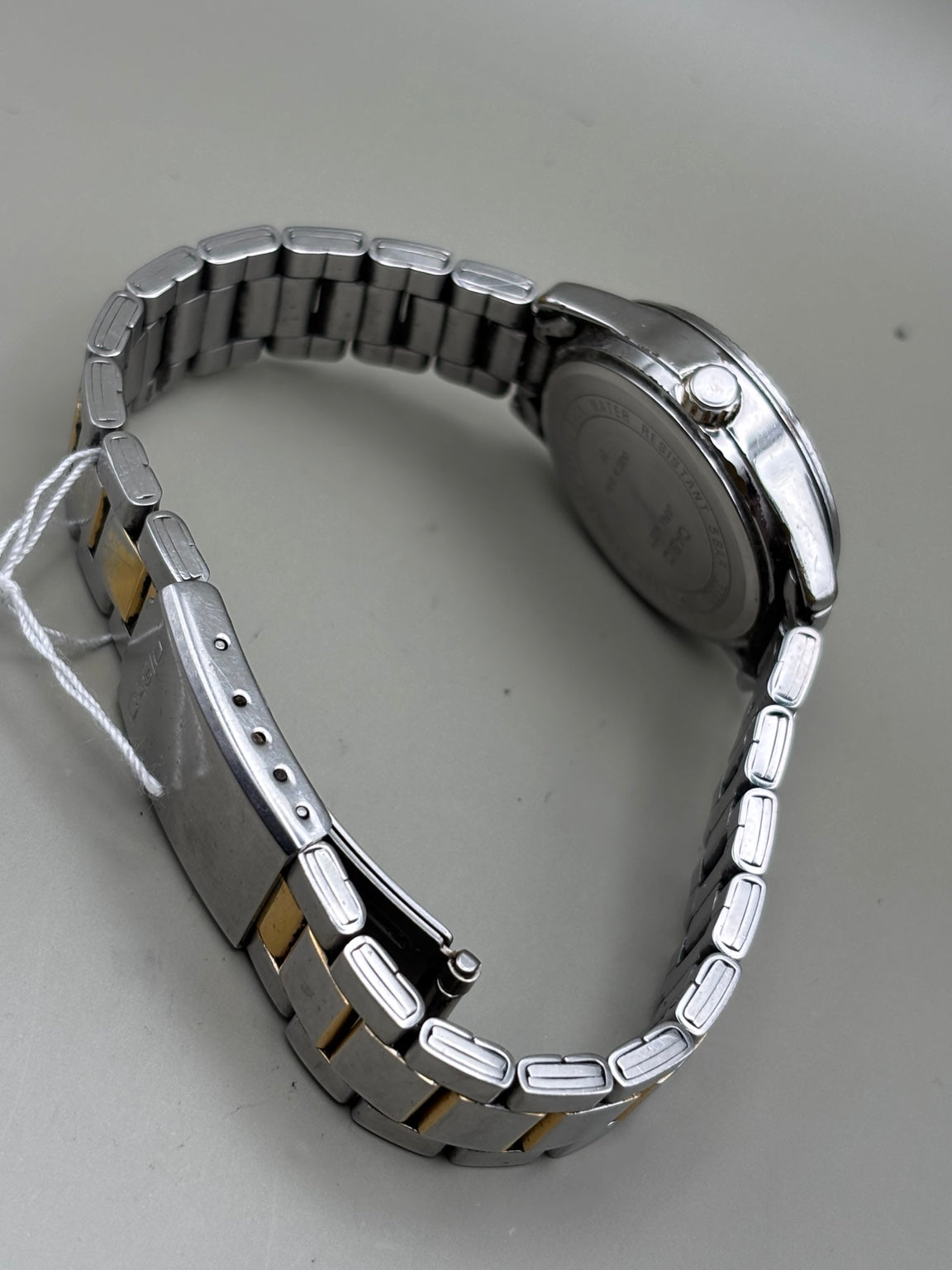 Casio LTP-1302 bracelet side and caseback
