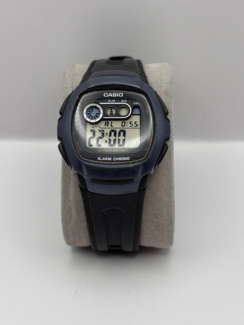 Blue Casio W-210 digital watch front view