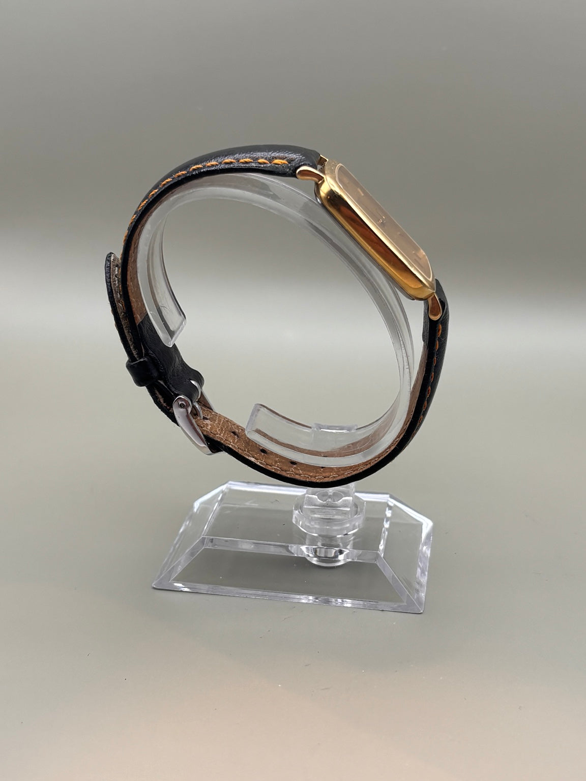 Certina Quartz rectangular gold-tone watch profile