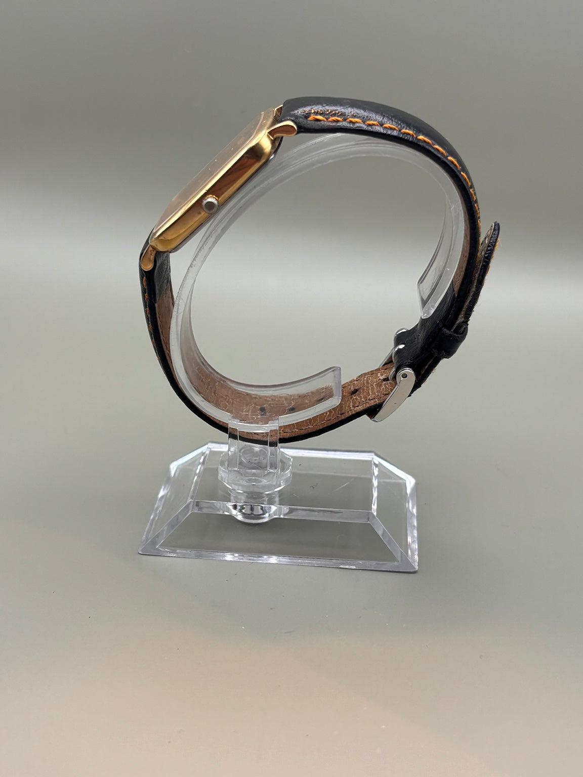 Certina Quartz rectangular gold-tone watch side