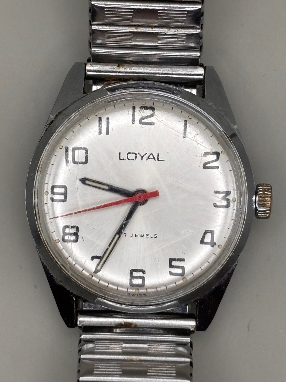Loyal 17 Jewels vintage mechanical watch silver dial close-up