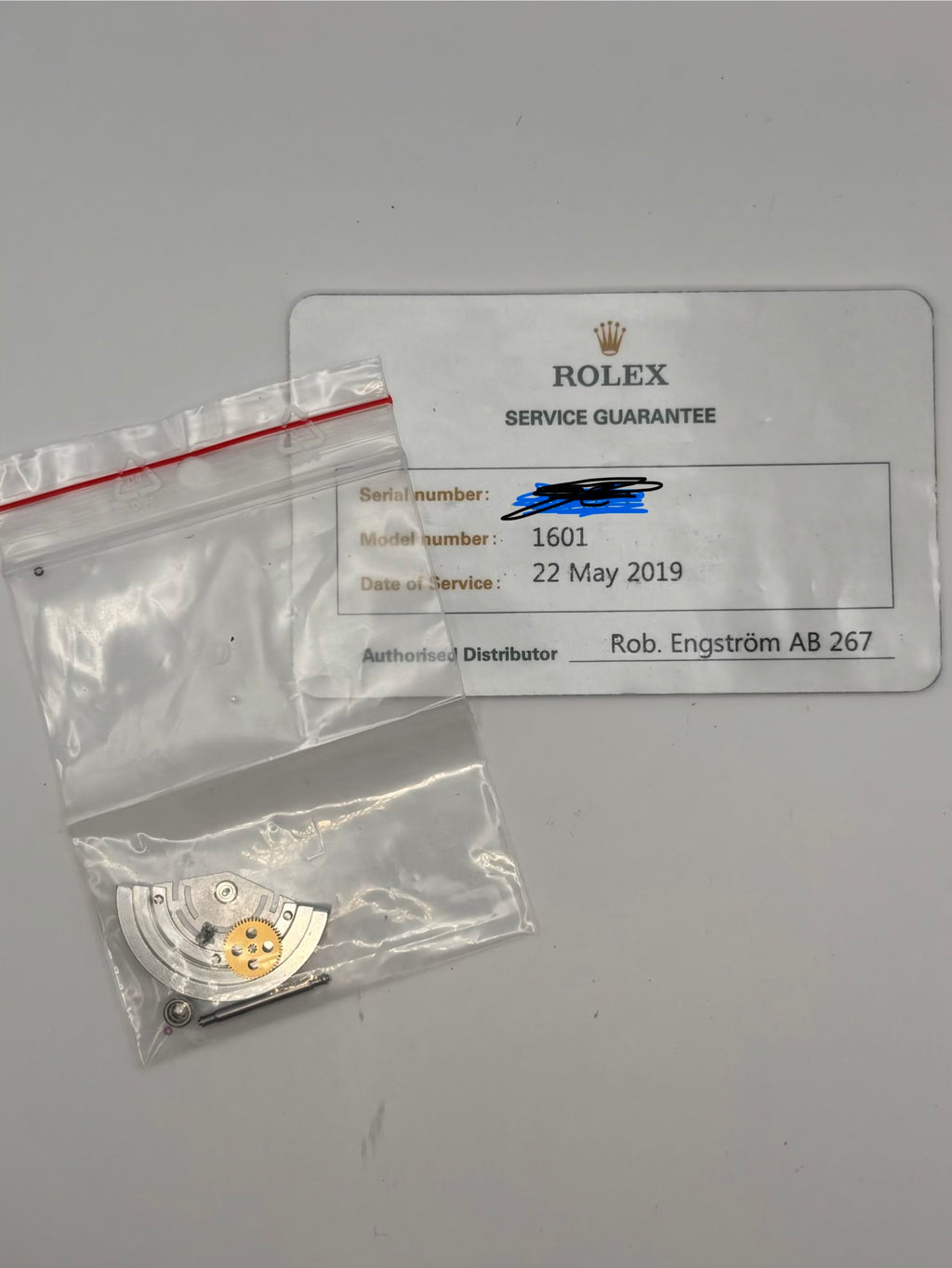 Rolex service guarantee card dated 22 May 2019 for model 1601 with service parts
