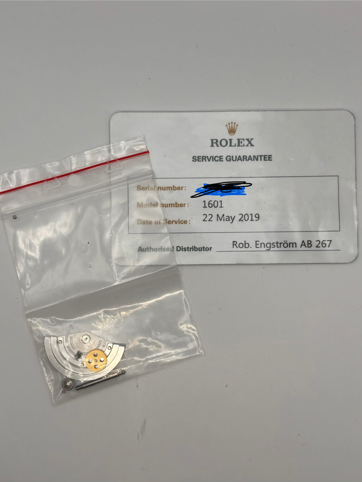 Rolex service guarantee card dated 22 May 2019 for model 1601 with service parts