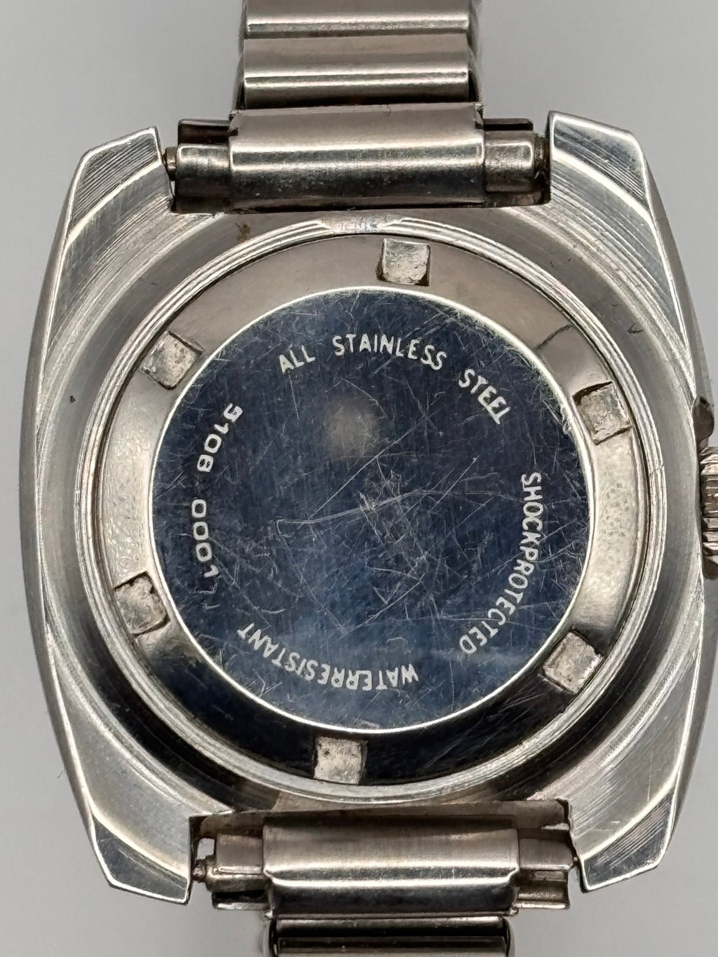 Sandoz automatic day-date stainless steel case back