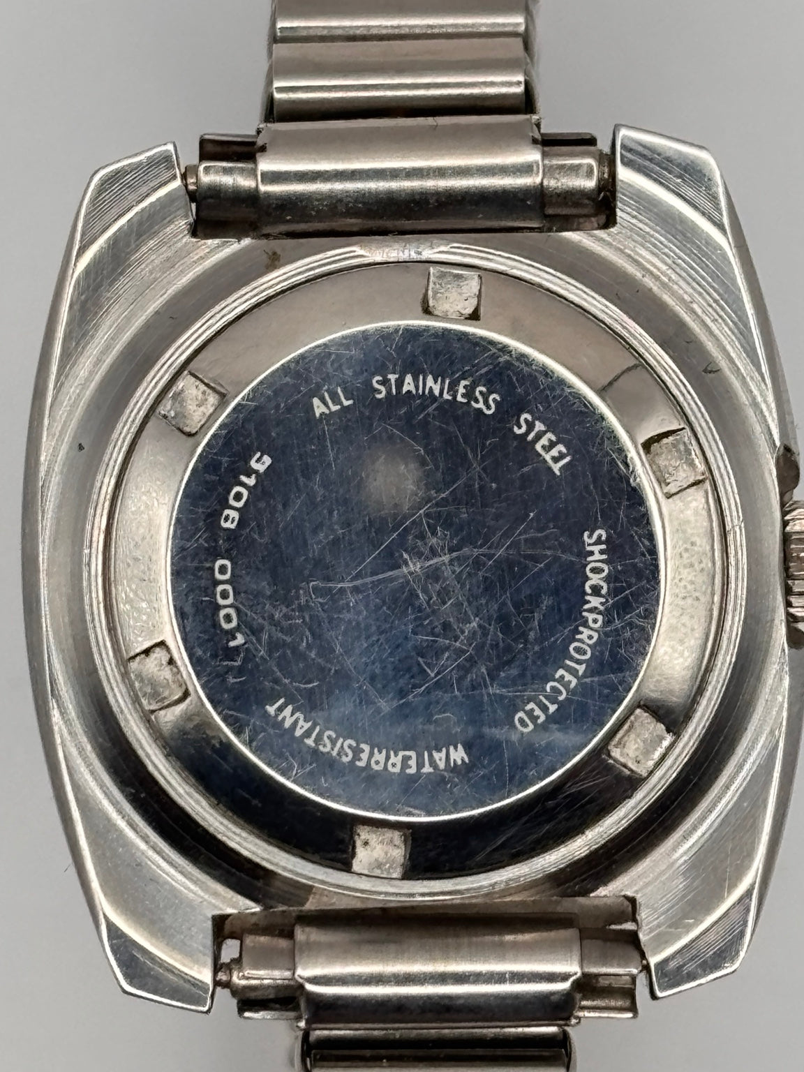 Sandoz automatic day-date stainless steel case back