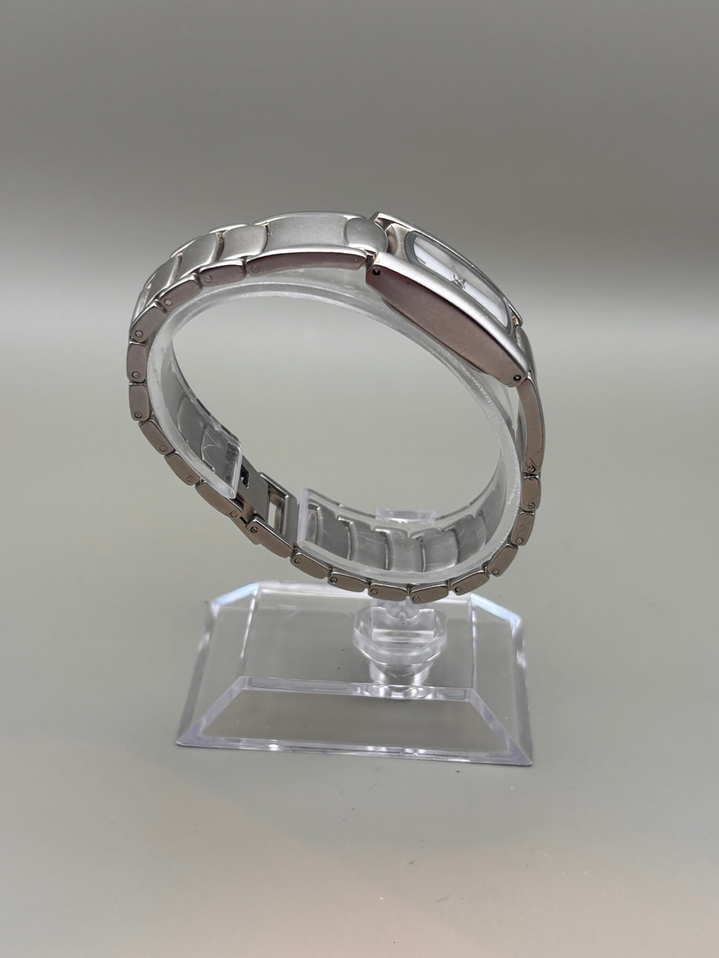 Ladies silver-tone rectangular quartz watch bracelet side