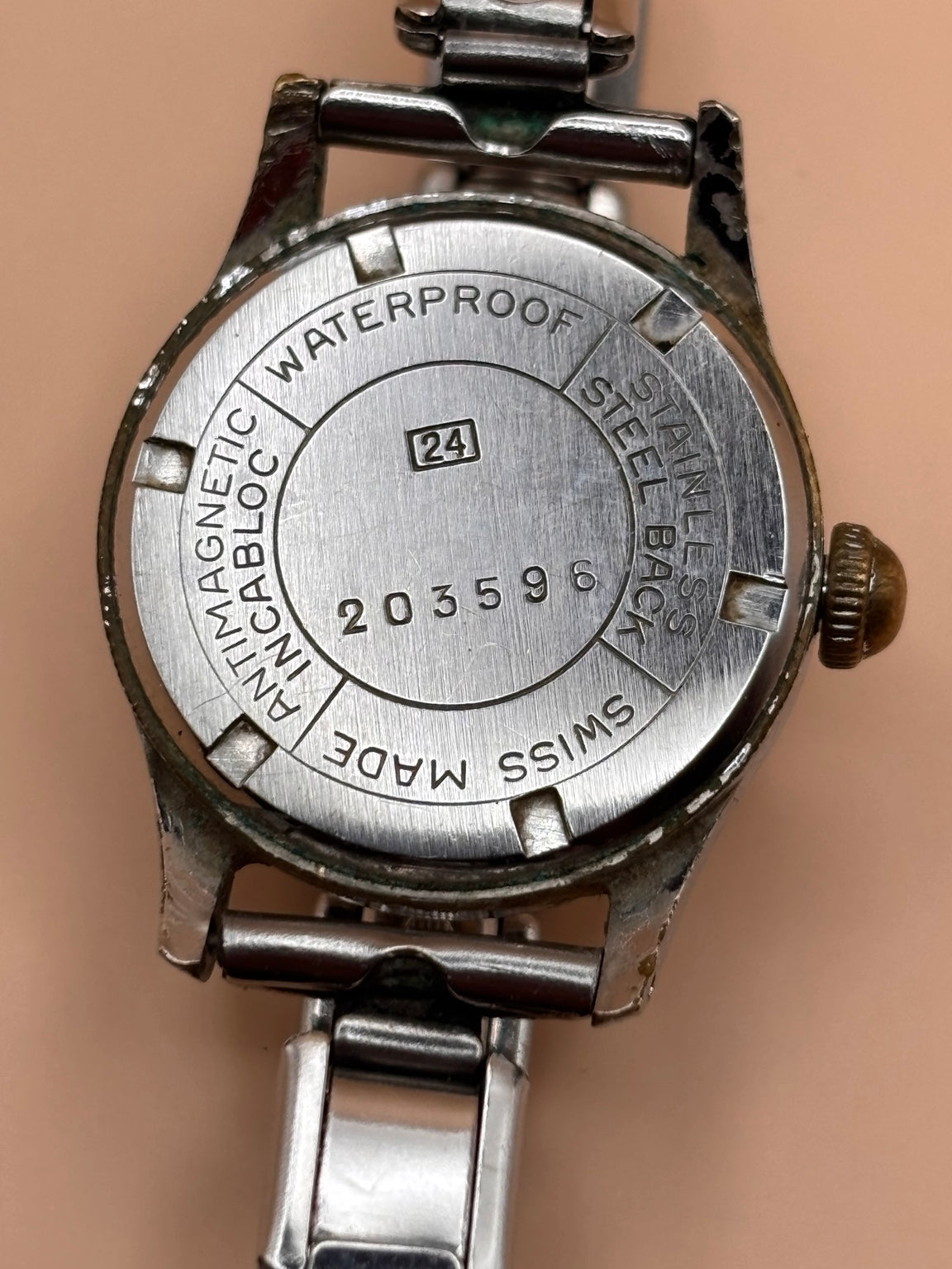 Vintage Swiss E.L. 10 watch caseback serial 203596